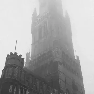 The Belfry of Bruges in the fog